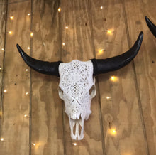 Hand Carved Cow Skulls