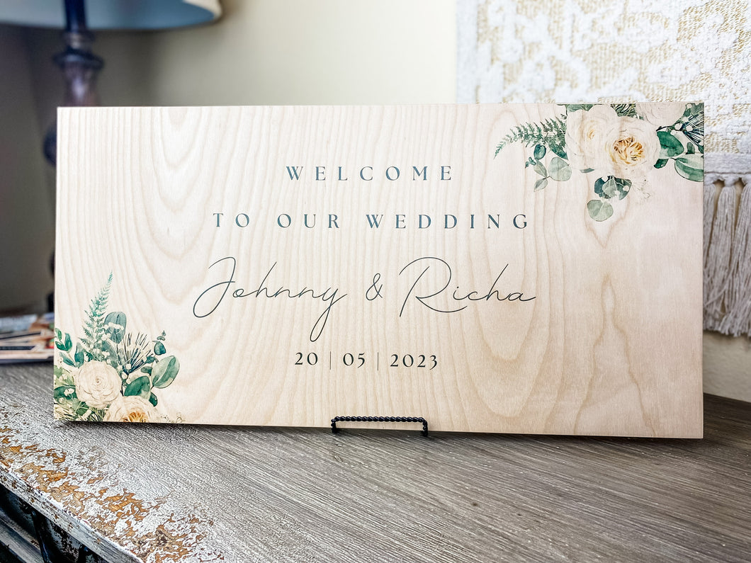Welcome to our wedding sign on wood with white roses