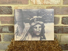 The Statue of Liberty on wood