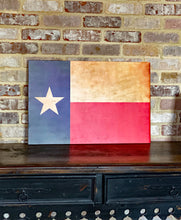 Vintage Texas map printed on wood.