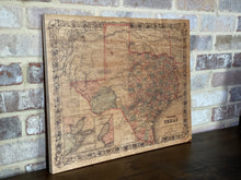 Vintage Texas map of 1870 printed on wood.