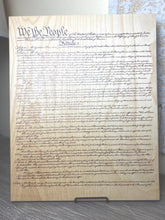 The Constitution of the United States of America  printed on wood.