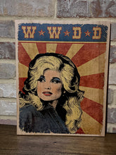 What would Dolly do sign printed on wood.